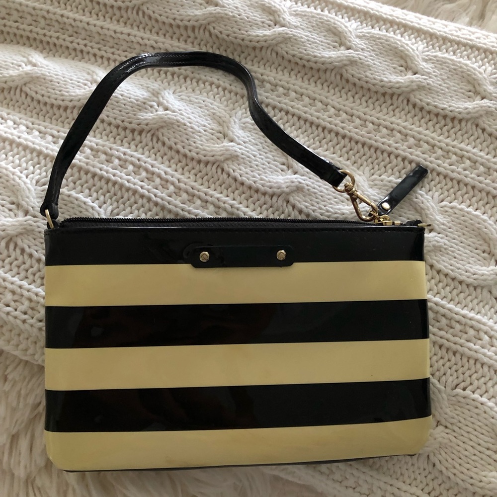 Black and white striped Kate spade clutch